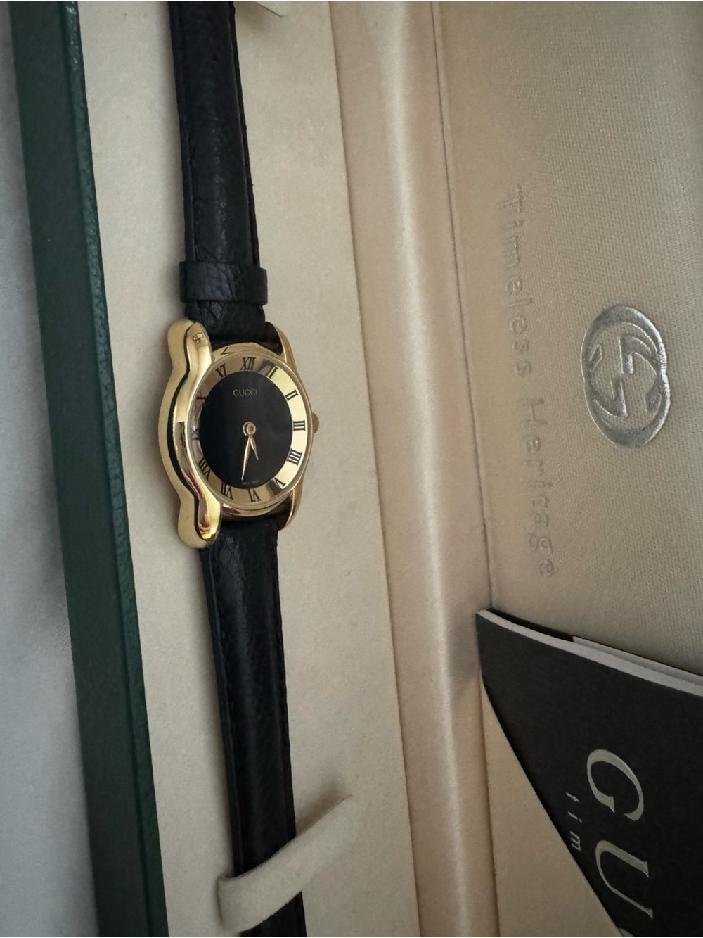 Gucci Black Dial Gold-Tone Women's Watch with Black Leather Strap